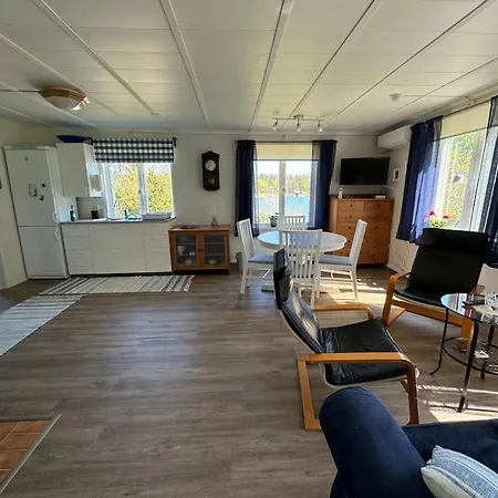 Chalet Majas Backe On A Island With Boat