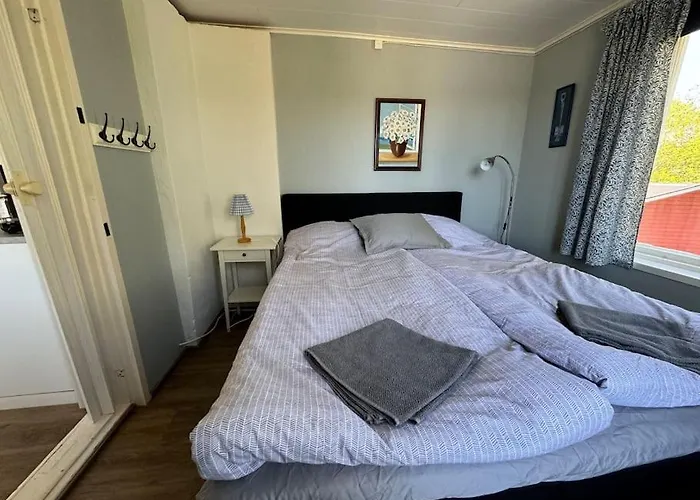 Шале Majas Backe On A Island With Boat Hammarland