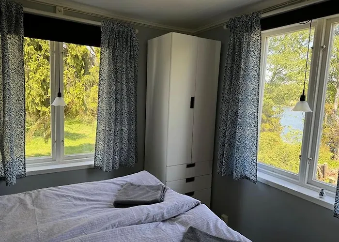 Шале Majas Backe On A Island With Boat Hammarland